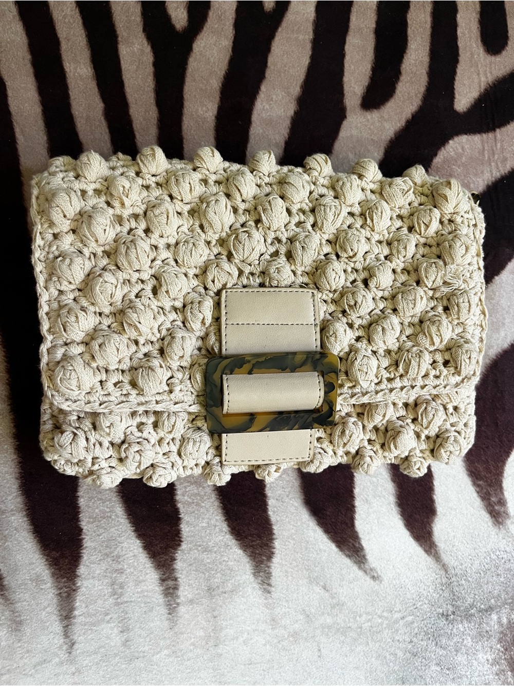 Cream Crochet Clutch Bag with Tortoiseshell Buckle.